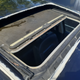 Image for article titled How I Fixed A Broken Sunroof In One Of The Most Unreliable Cars Of The Modern Era